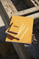 SCHRIJFBLOK RHODIA A5 LIJN 80 VEL 80GR MET KANTLIJN ORANJE-2